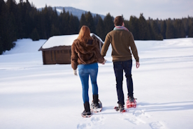 Couple snowshoeing