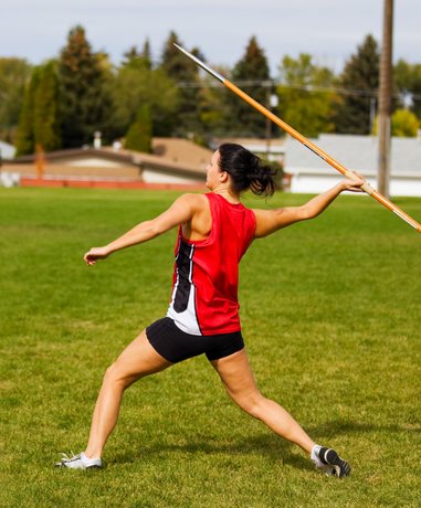 Athlete participating in shot put event