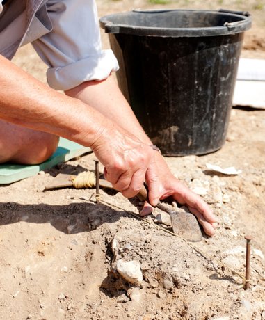 Archaeologists working at a dig site