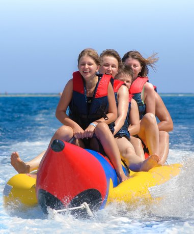 Participants enjoying banana boating