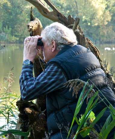 Bird watcher in natural habitat