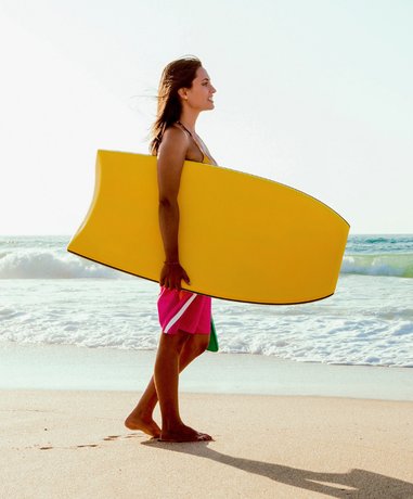 Body boarder riding a wave