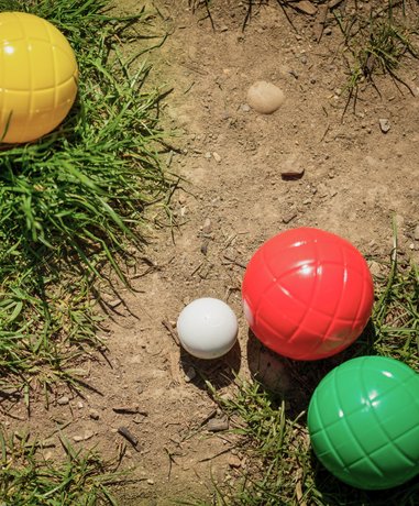 Boules player aiming in a game
