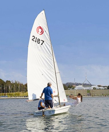 Dinghy sailing on a clear day
