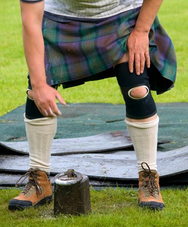 Athlete participating in traditional Highland games
