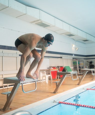 Diver performing indoor dive