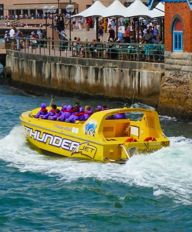 Jet boat speeding through water