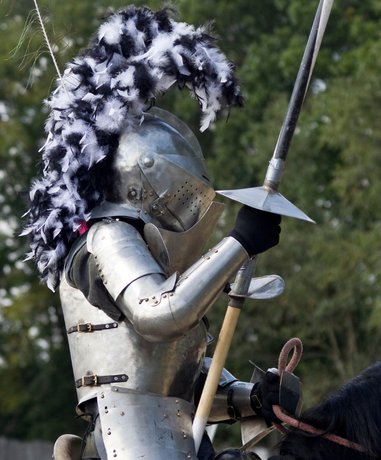 Jousting knights in armor on horseback
