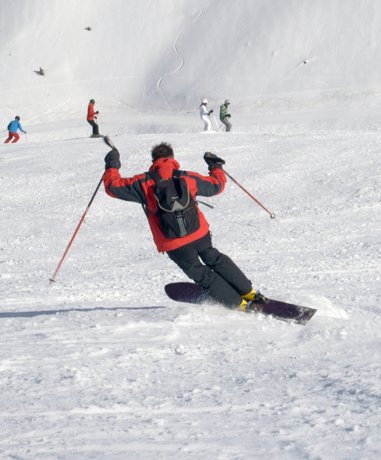 Skier in action on a snowy mountain
