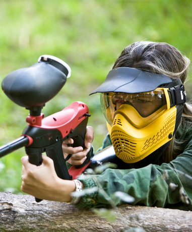 Paintball player in action