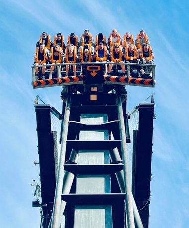 Visitors enjoying a roller coaster ride