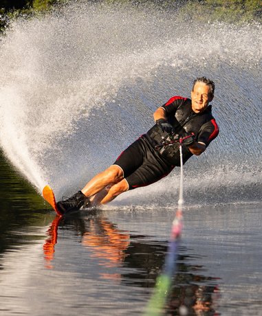 Water skier gliding on water